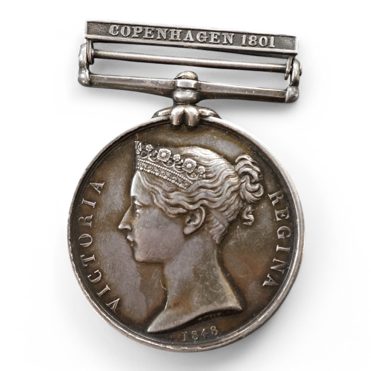 A Naval General Service medal with Copenhagen 1801 clasp awarded to R. Brown Asst. Surgeon. (of the 49th Foot). Condition - fair to good, lacking ribbon